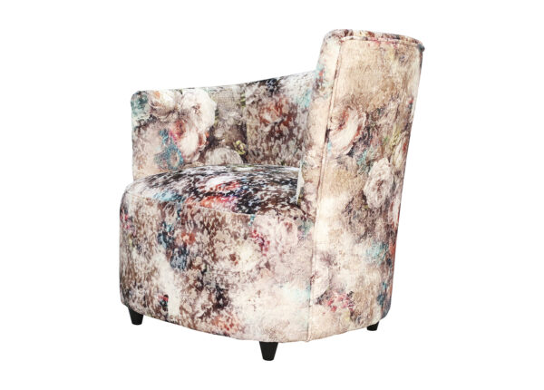 fauteuil PERLE tapissé d'un tissu motif rose, bleu et noir.