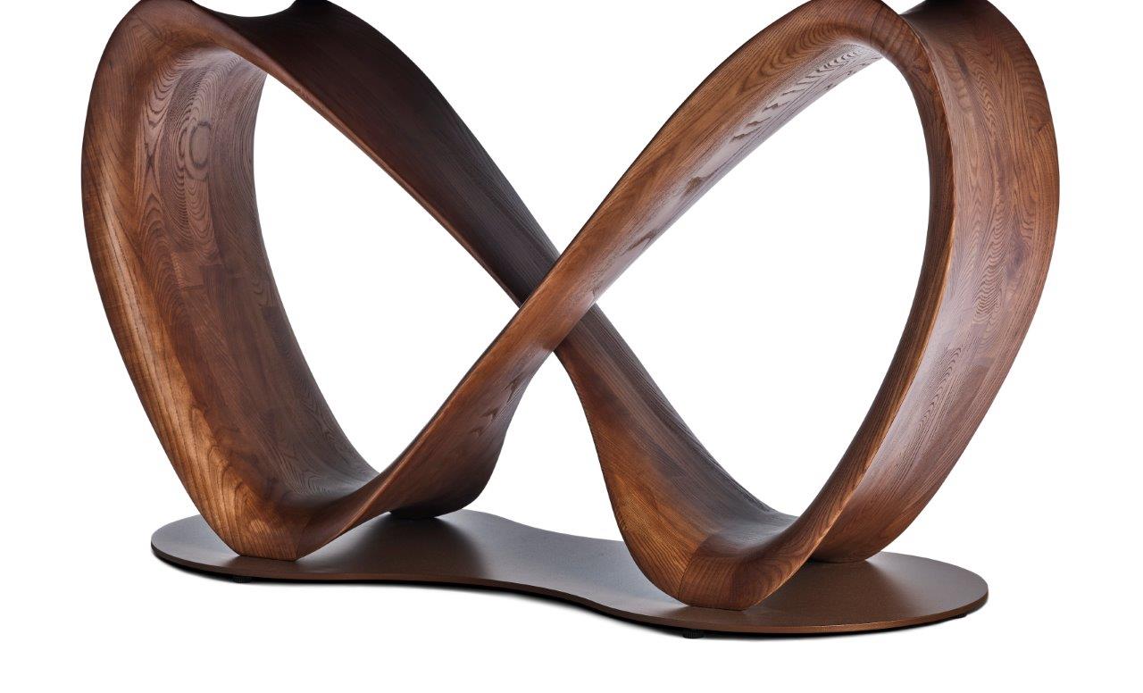 Table LIRA en céramique avec pied en forme infini. Plusieurs céramiques au choix, plusieurs dimensions : 220 cm ou 260 CM. Coloris du pied au choix : Noyer ou noir