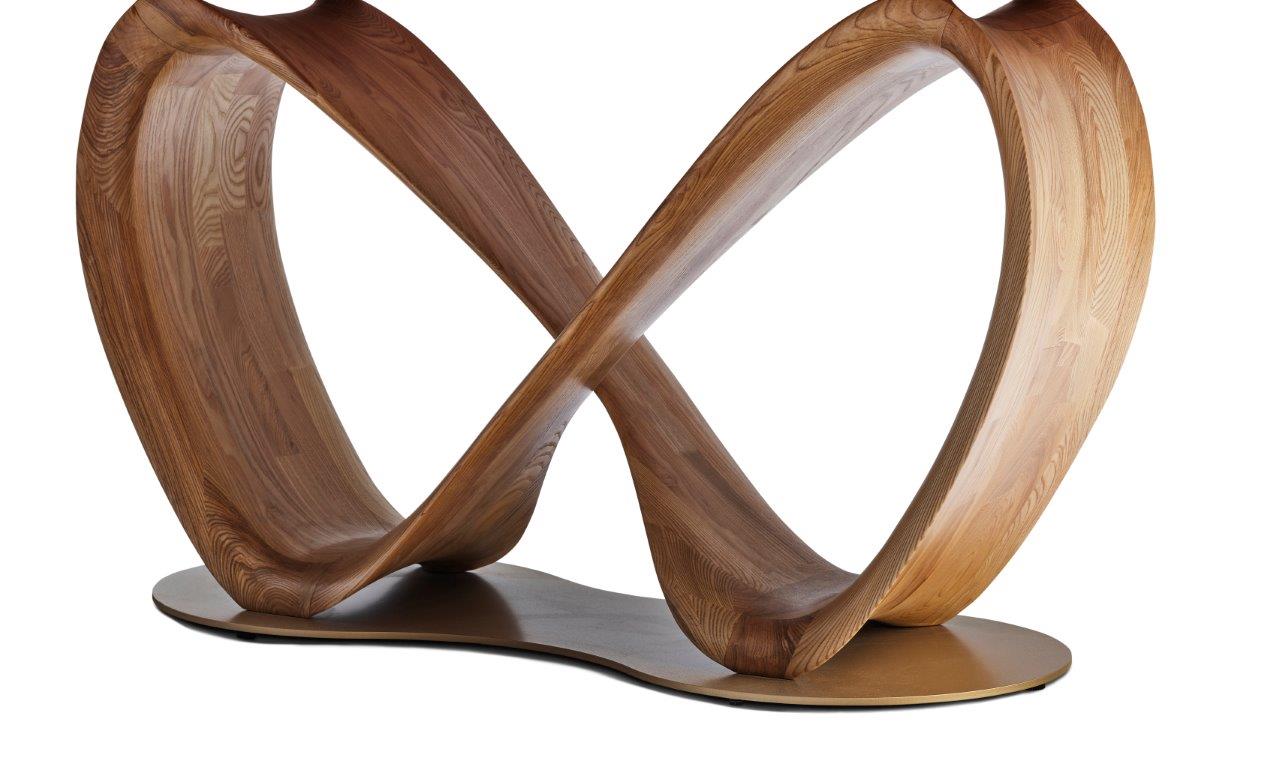 Table LIRA en céramique avec pied en forme infini. Plusieurs céramiques au choix, plusieurs dimensions : 220 cm ou 260 CM. Coloris du pied au choix : Noyer ou noir