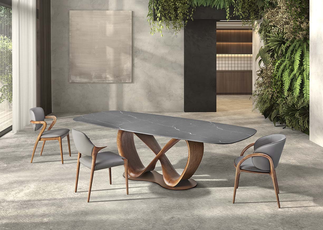 Table LIRA en céramique avec pied en forme infini. Plusieurs céramiques au choix, plusieurs dimensions : 220 cm ou 260 CM. Coloris du pied au choix : Noyer ou noir