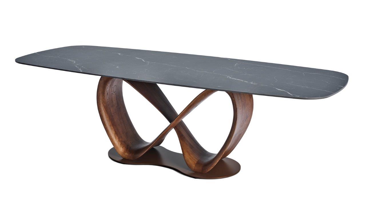 Table LIRA en céramique avec pied en forme infini. Plusieurs céramiques au choix, plusieurs dimensions : 220 cm ou 260 CM. Coloris du pied au choix : Noyer ou noir