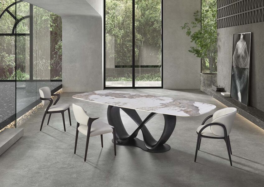 Table LIRA en céramique avec pied en forme infini. Plusieurs céramiques au choix, plusieurs dimensions : 220 cm ou 260 CM. Coloris du pied au choix : Noyer ou noir