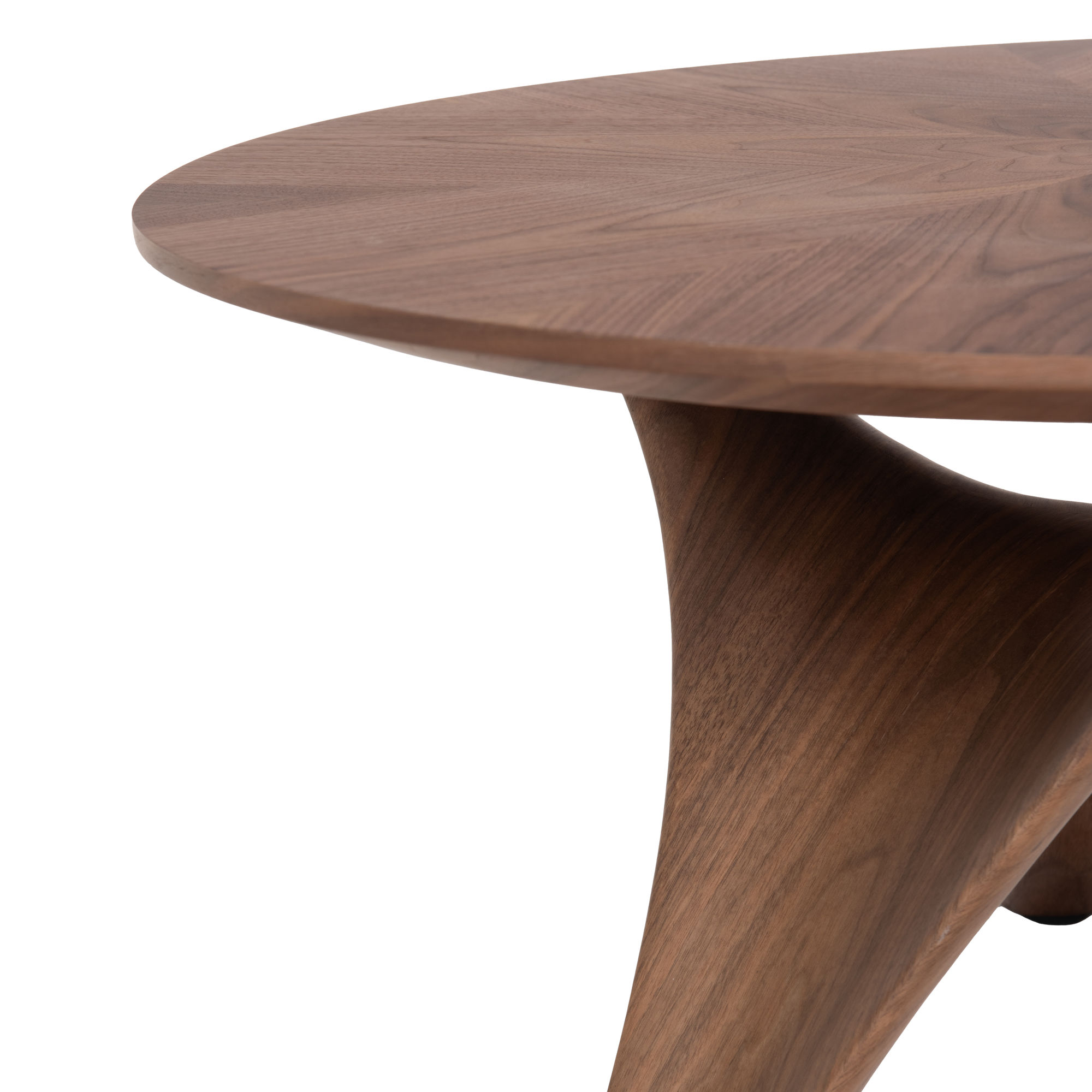 ZOOM sur la table basse en noyer avec piètement central structural, diamètre 80cm